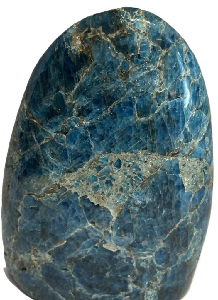 Natural blue apatite polished freeform with flat base 1 sians emporium Polished natural blue apatite standing freeform crystal showing rich teal veining on a flat base